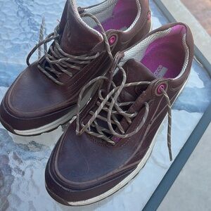 Brown leather walking shoes.